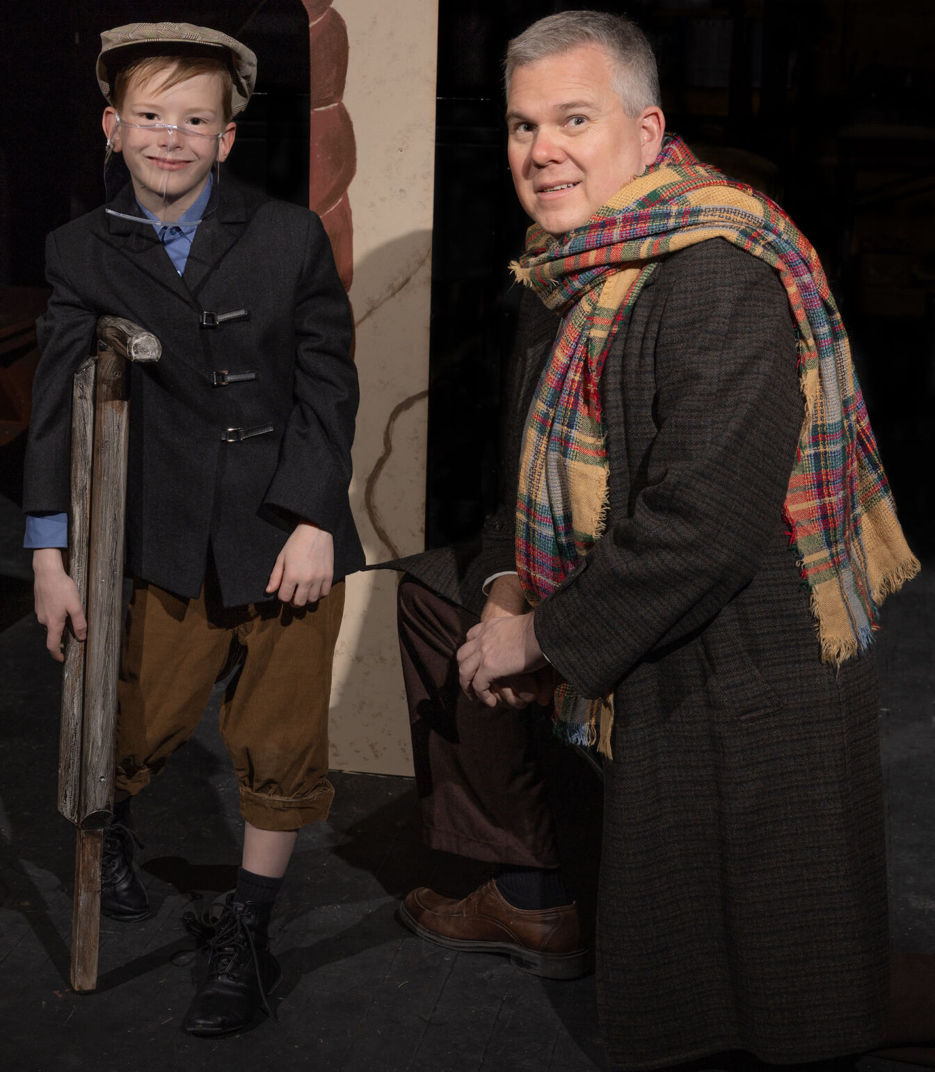 Owen Ahlmer as Tiny Tim with Rob Tilley as Bob Cratchit